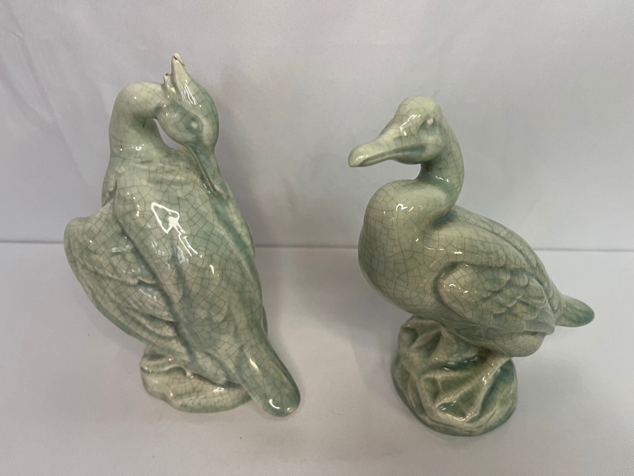 Art Deco Pair cormorants cracked ceramic signed circa 1940