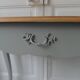 Console, side desk of beautiful craftsmanship re-enchanted in verdigris