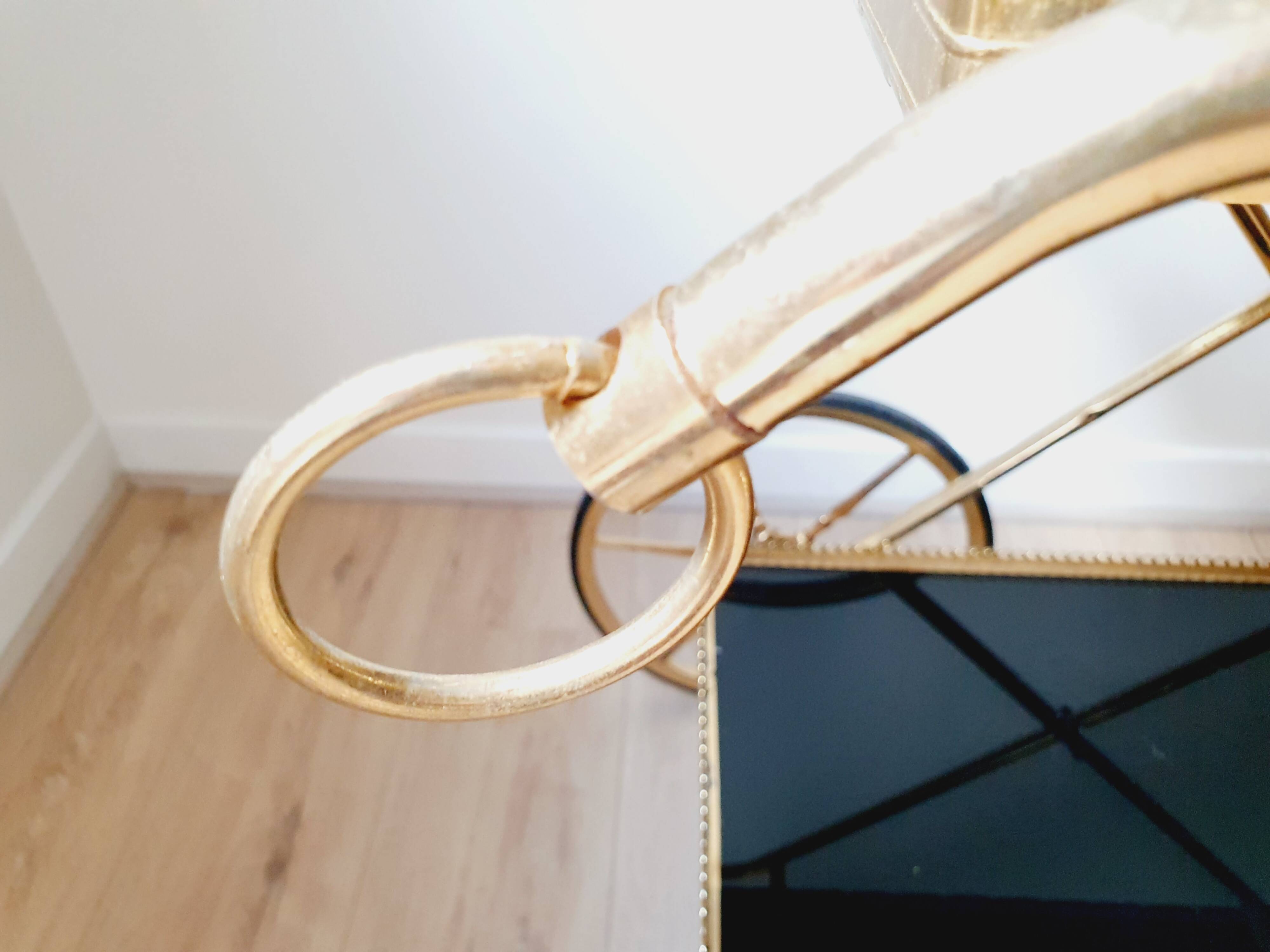 Vintage golden metal dessert on wheels
