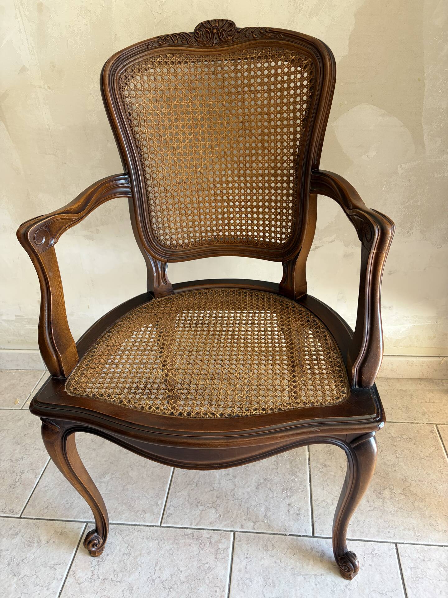 Wood and cane armchair