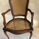 Wood and cane armchair