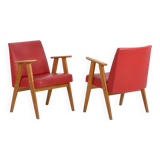 2 red armchairs, circa 1960