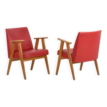 2 red armchairs, around 1960