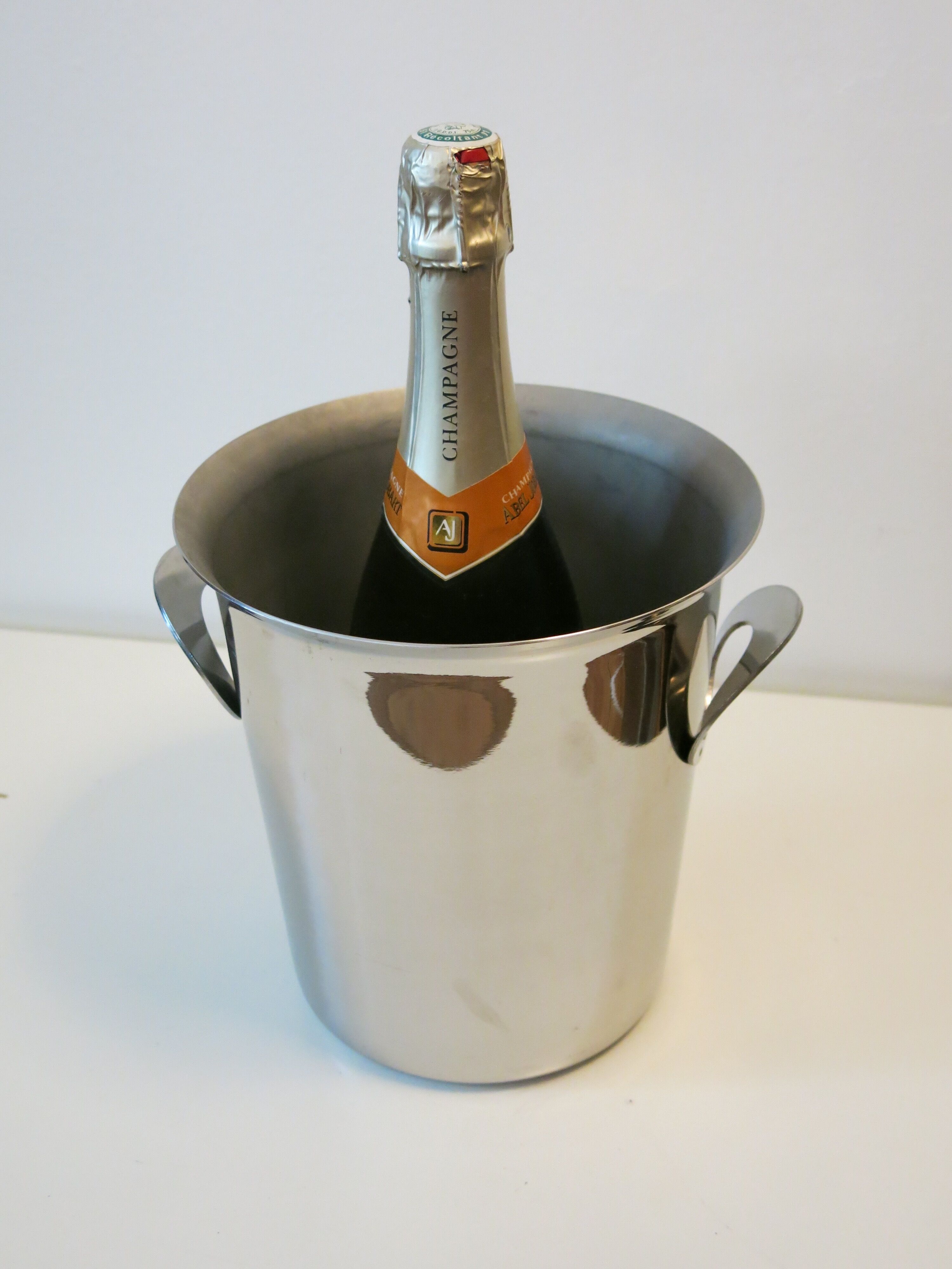 Stainless steel ice bucket by Jean Couzon