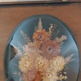 3 frames of dried flowers in curved glass