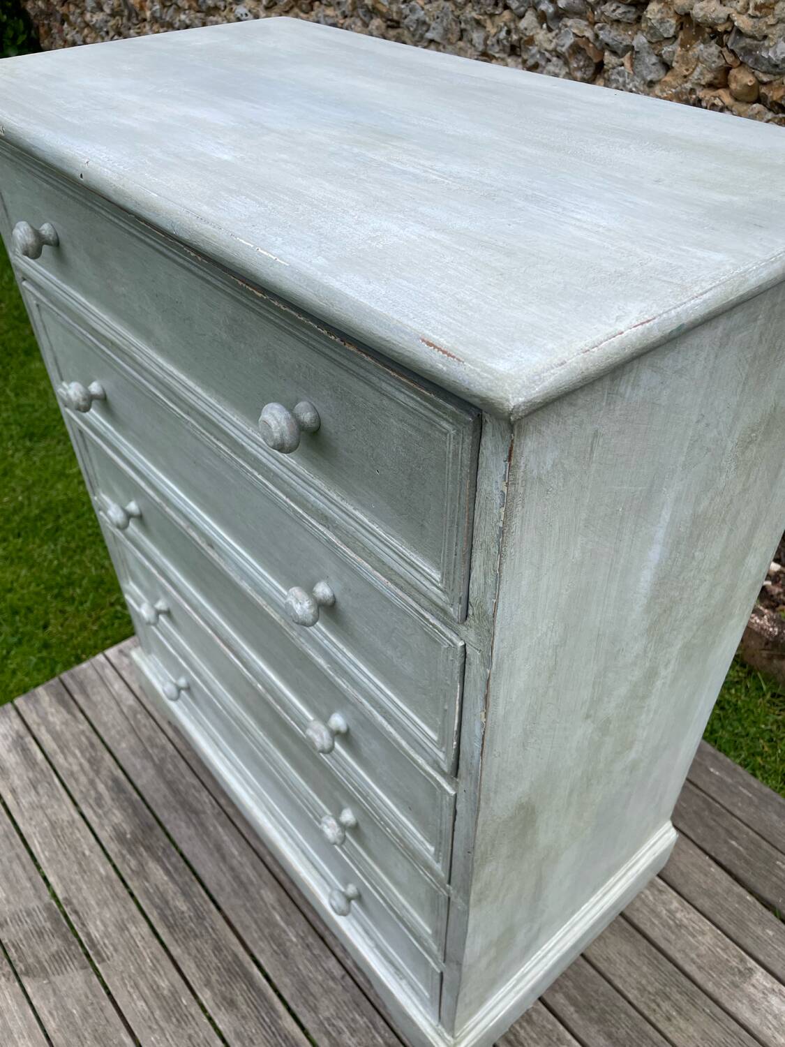 Vintage chest of drawers with white patina