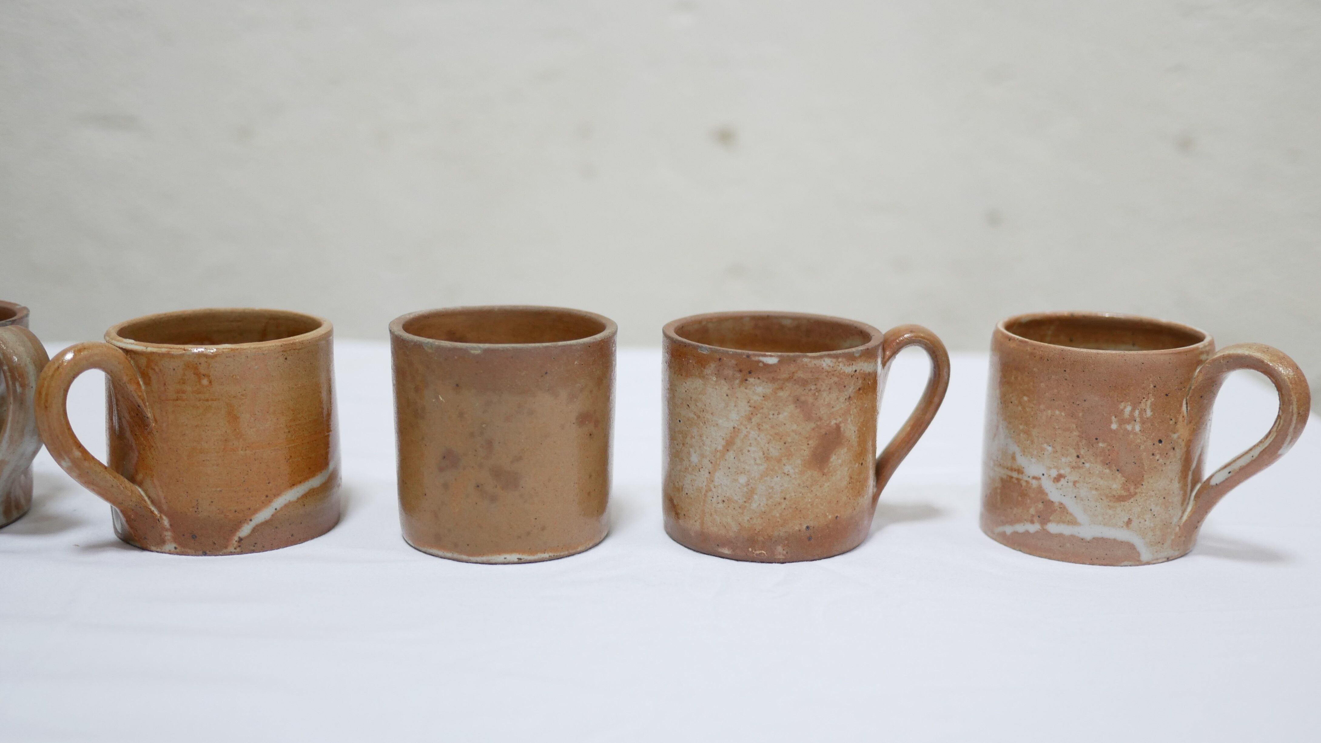 Series of 8 cups and vintage stoneware cups