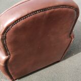 Club chair in brown leather