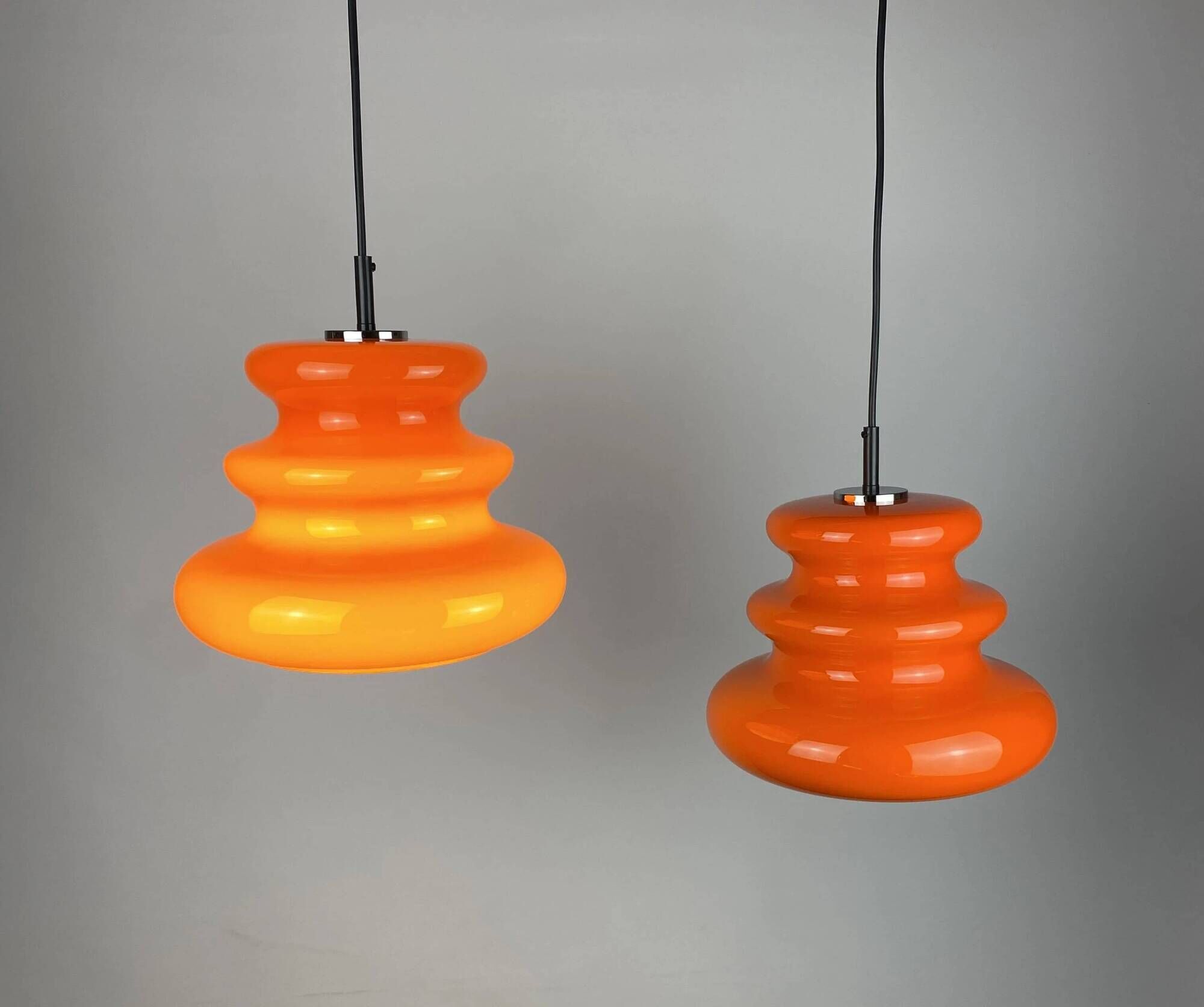 Bright orange glass pendant light AH 1 by Peill and Putzler 1960