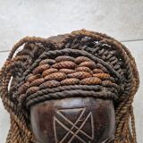 Chokwe Mwana Pwo mask in carved wood with a dark patina and rope hair