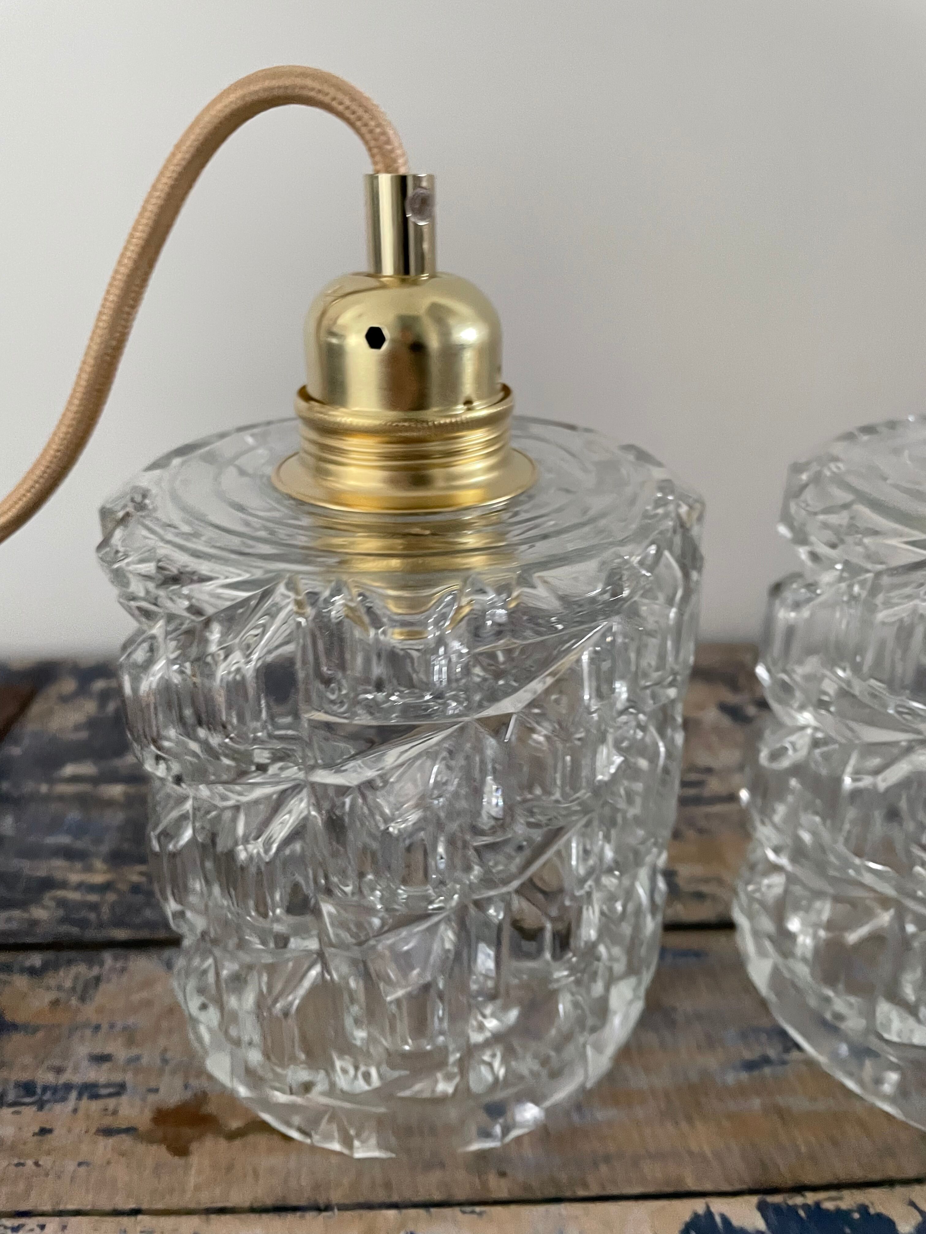 Set of two vintage electric chiseled glass walking lamps