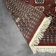 Handwoven red Boukhara oriental rug, 1960s
