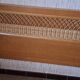 Vintage 1970s single rattan bed in blond wood
