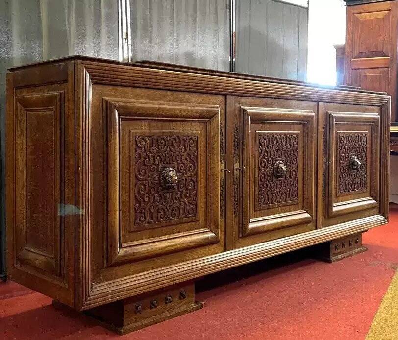 According to Charles Dudouyt: sideboard in a row from the Art Deco period in solid wood.