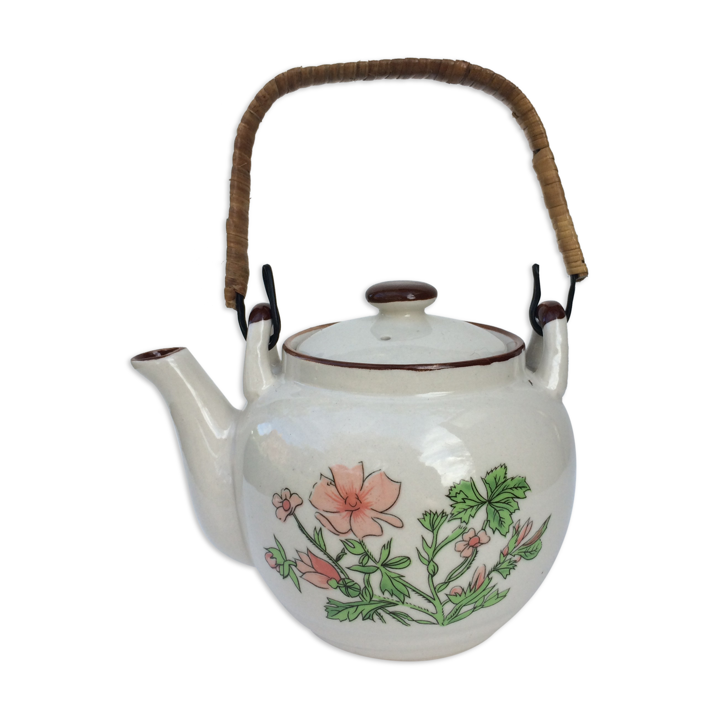 Vintage teapot with wicker handle
