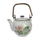Vintage teapot with wicker handle