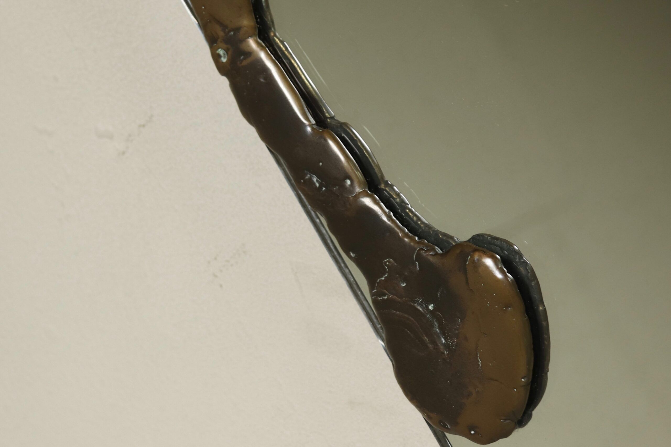 Lothar Klute sculptural bronze wall mirror with glass shelf 1990s