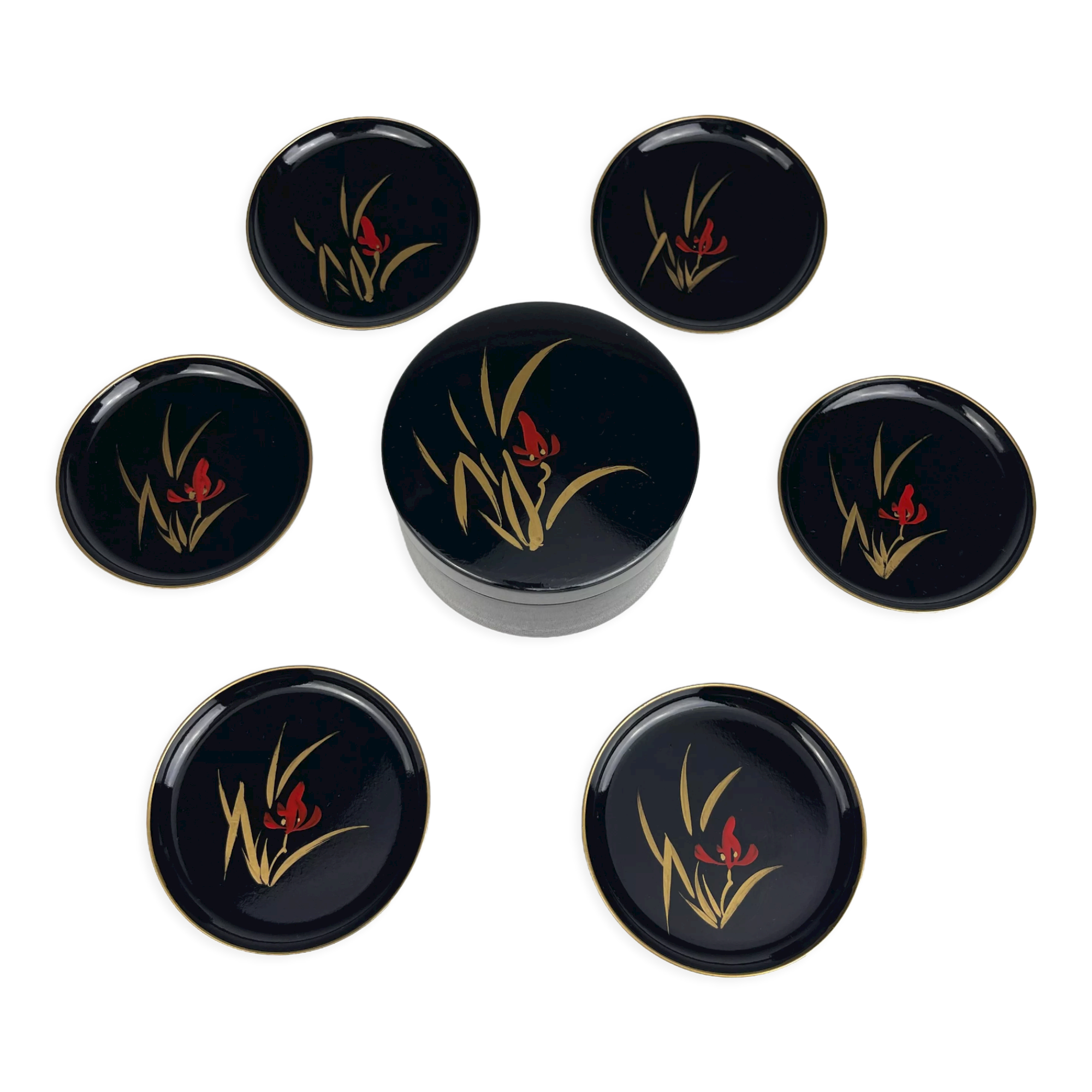 Coasters and their vintage black lacquered wooden box