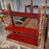 Gold metal wall shelf