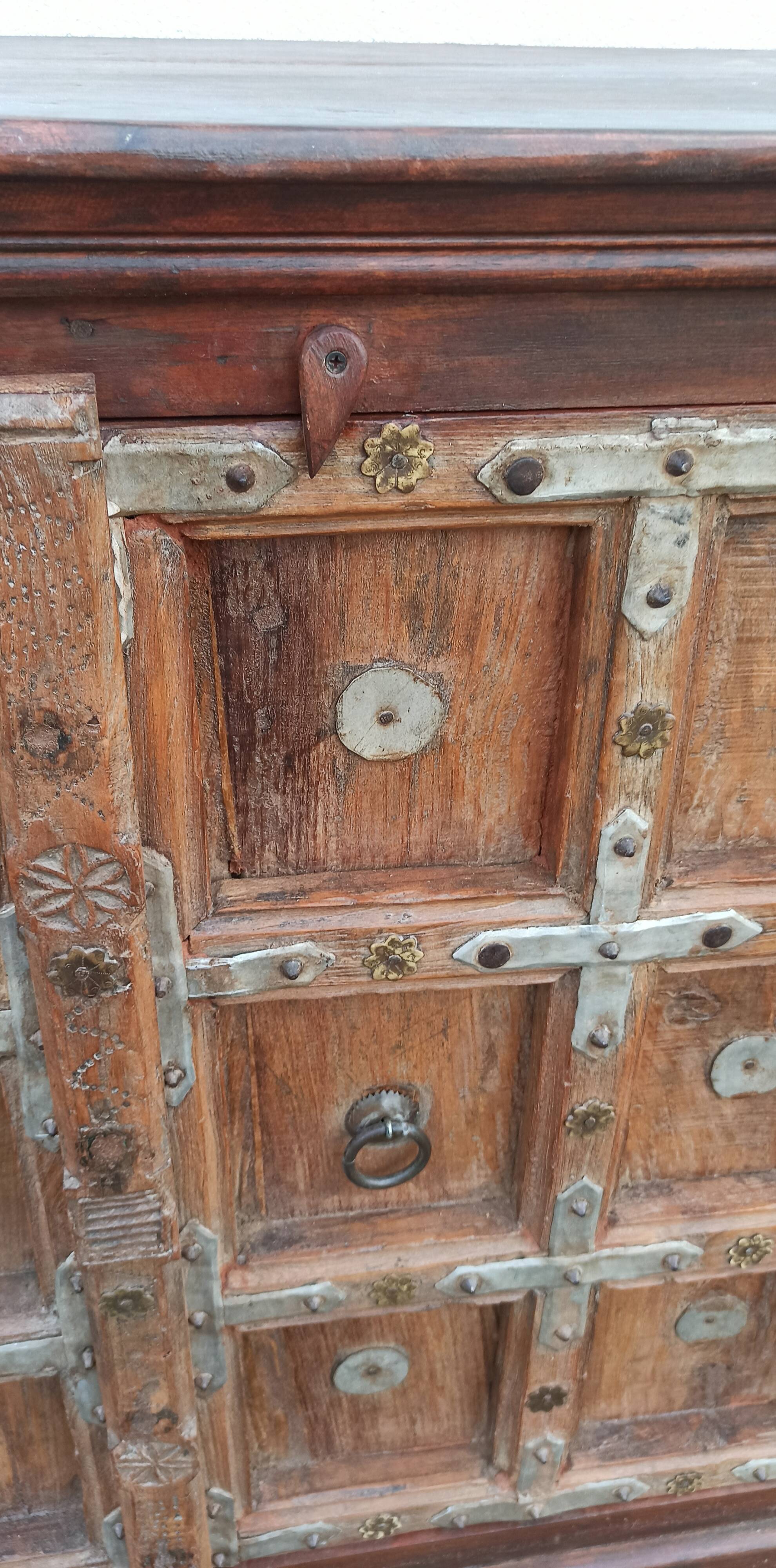 Small old wooden sideboard with two doors