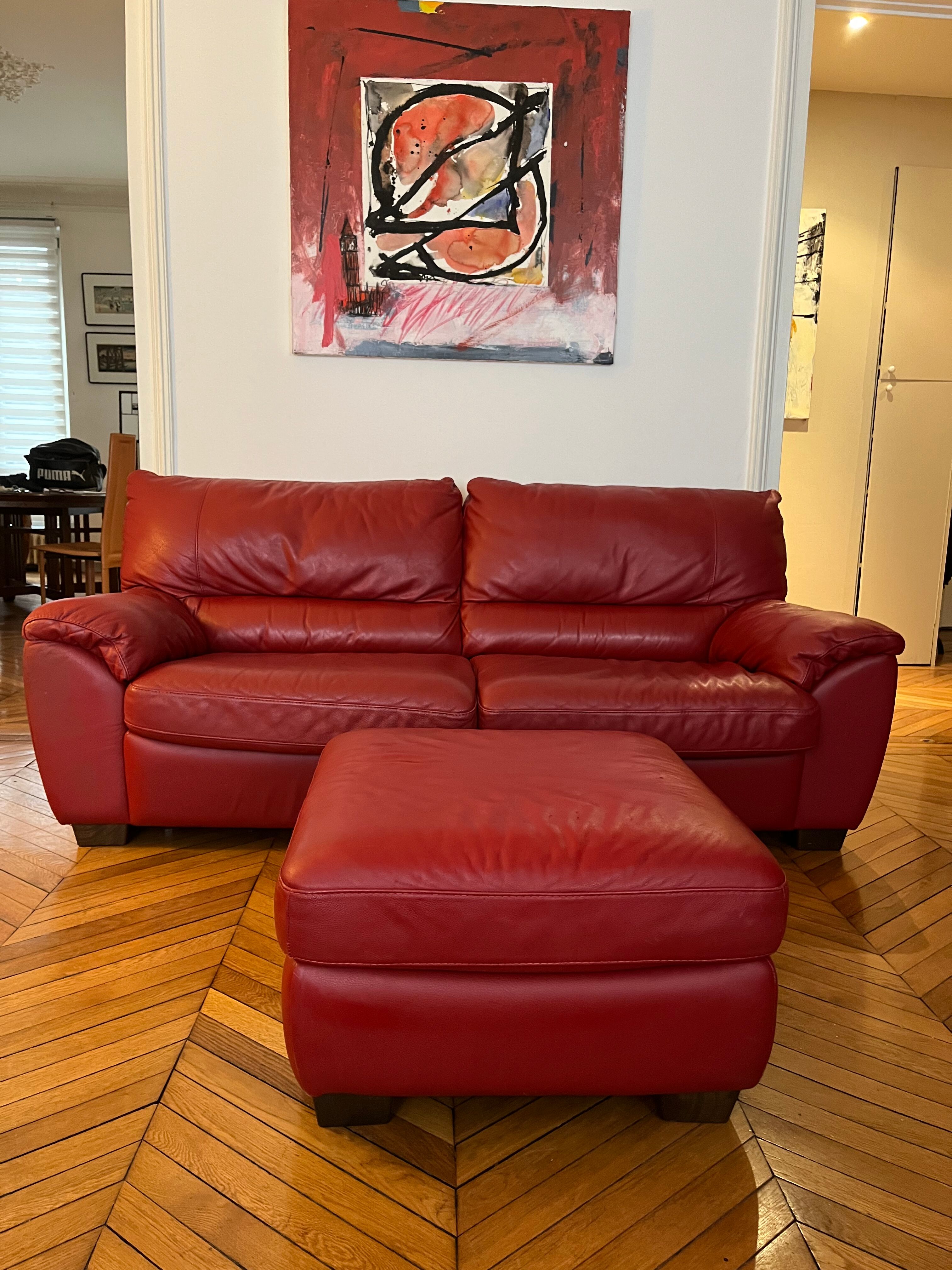 Set convertible leather sofa and footrest Natuzzi