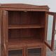 Old wooden glazed cabinet with four doors