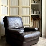 Brown leather armchair
