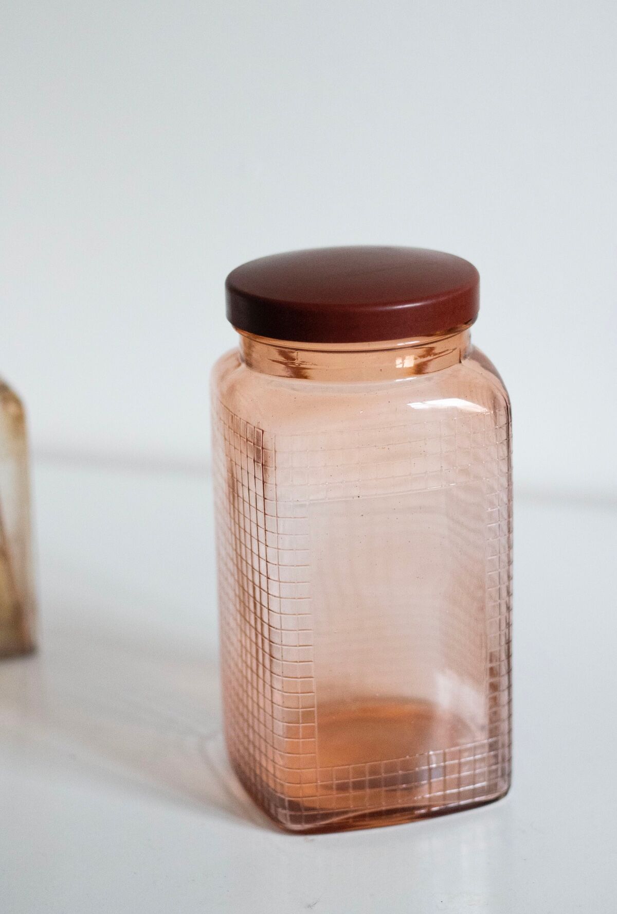 Vintage pink glass grocery jar