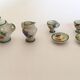 Small antique tea set in porcelain for children.