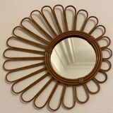 Old vintage asymmetrical round rattan mirror