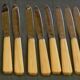 Set of 11 cheese knives or vintage dessert stainless steel blade.