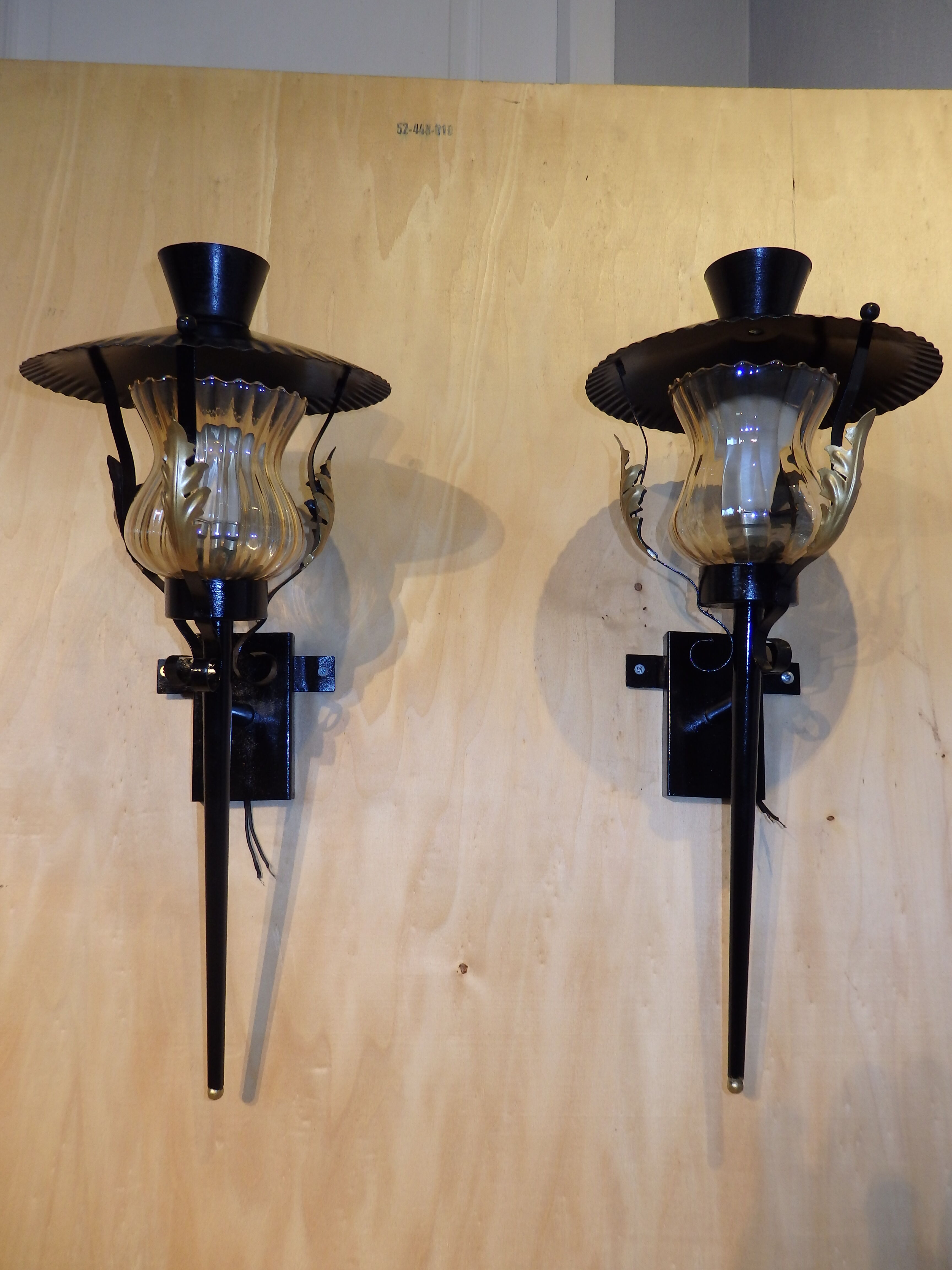 Pair of vintage torch wall lamps
