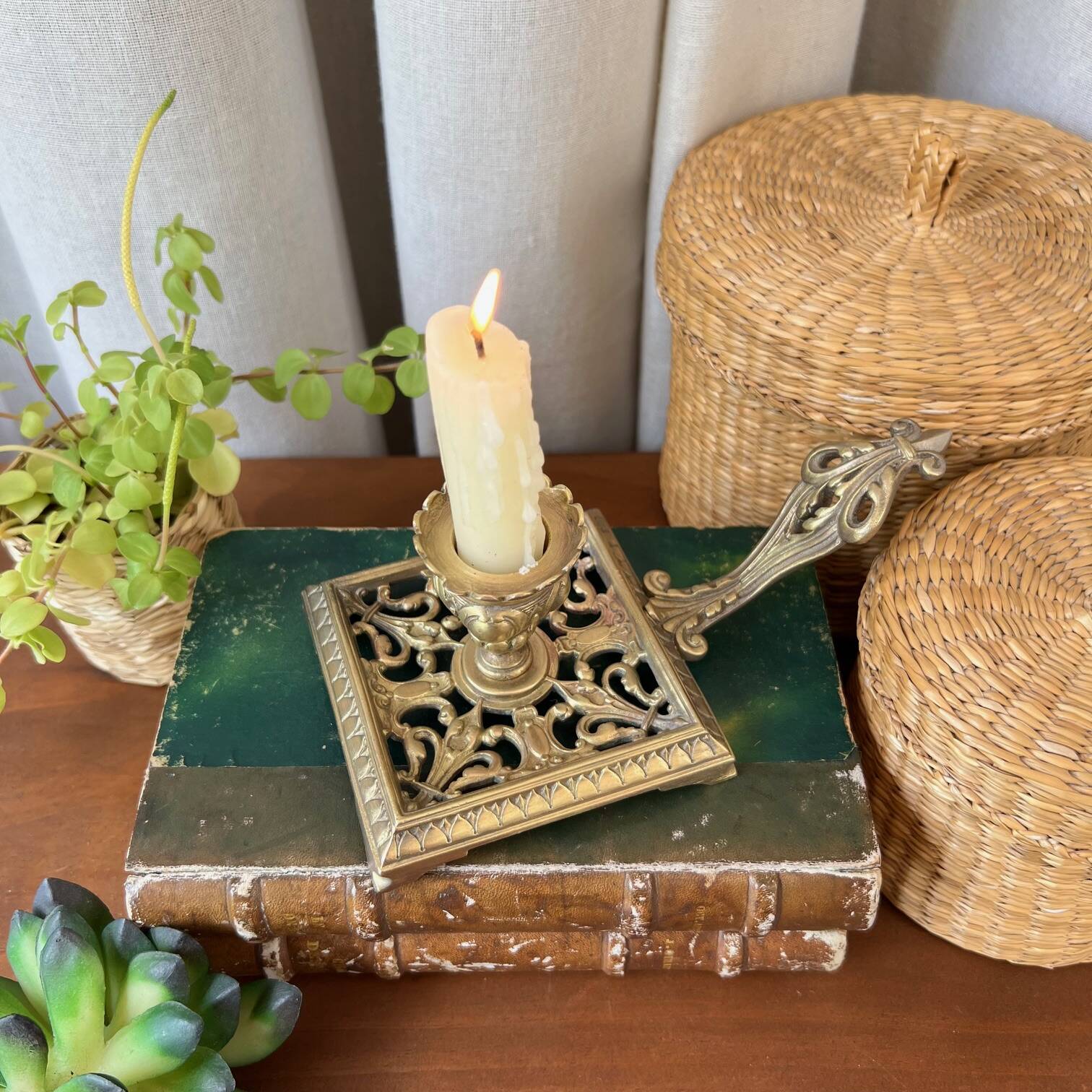 Bronze cellar rat candle holder