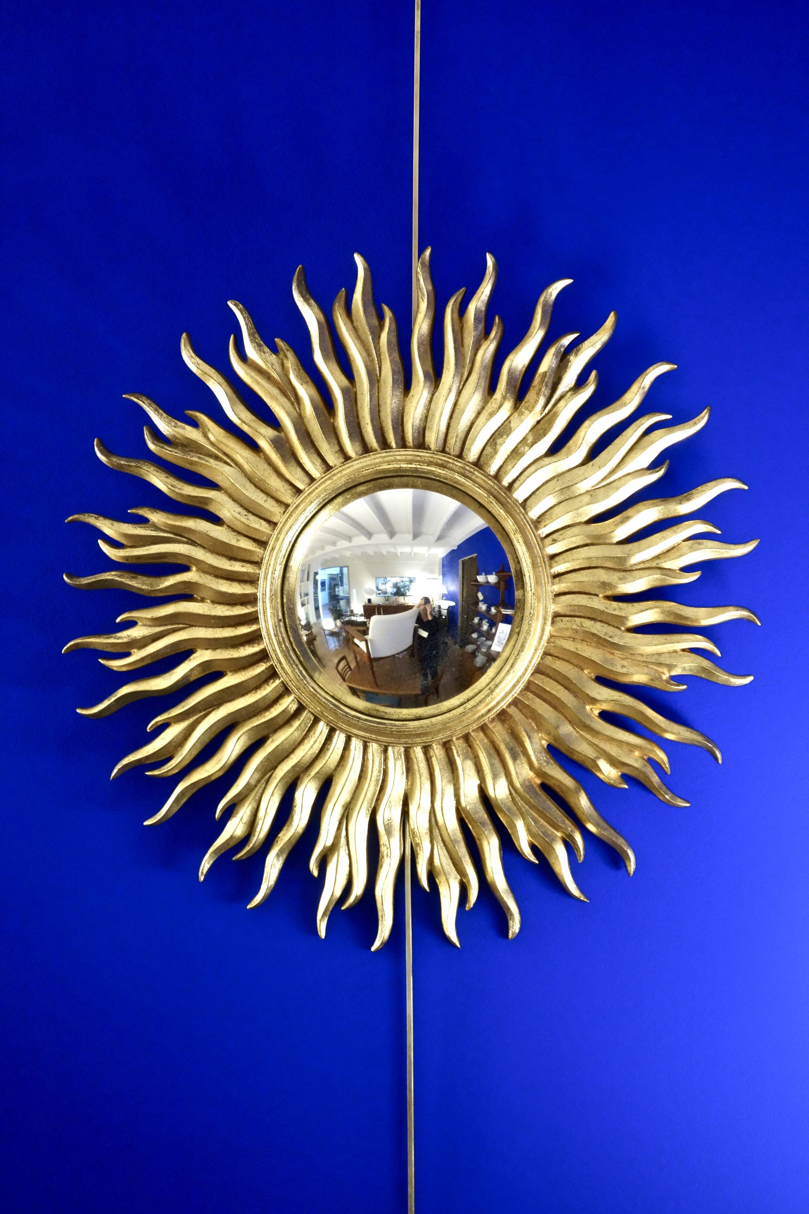 Vintage convex sun mirror in gilded wood, France 1960's