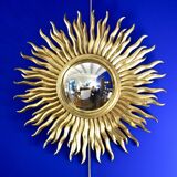 Vintage convex sun mirror in gilded wood, France 1960's