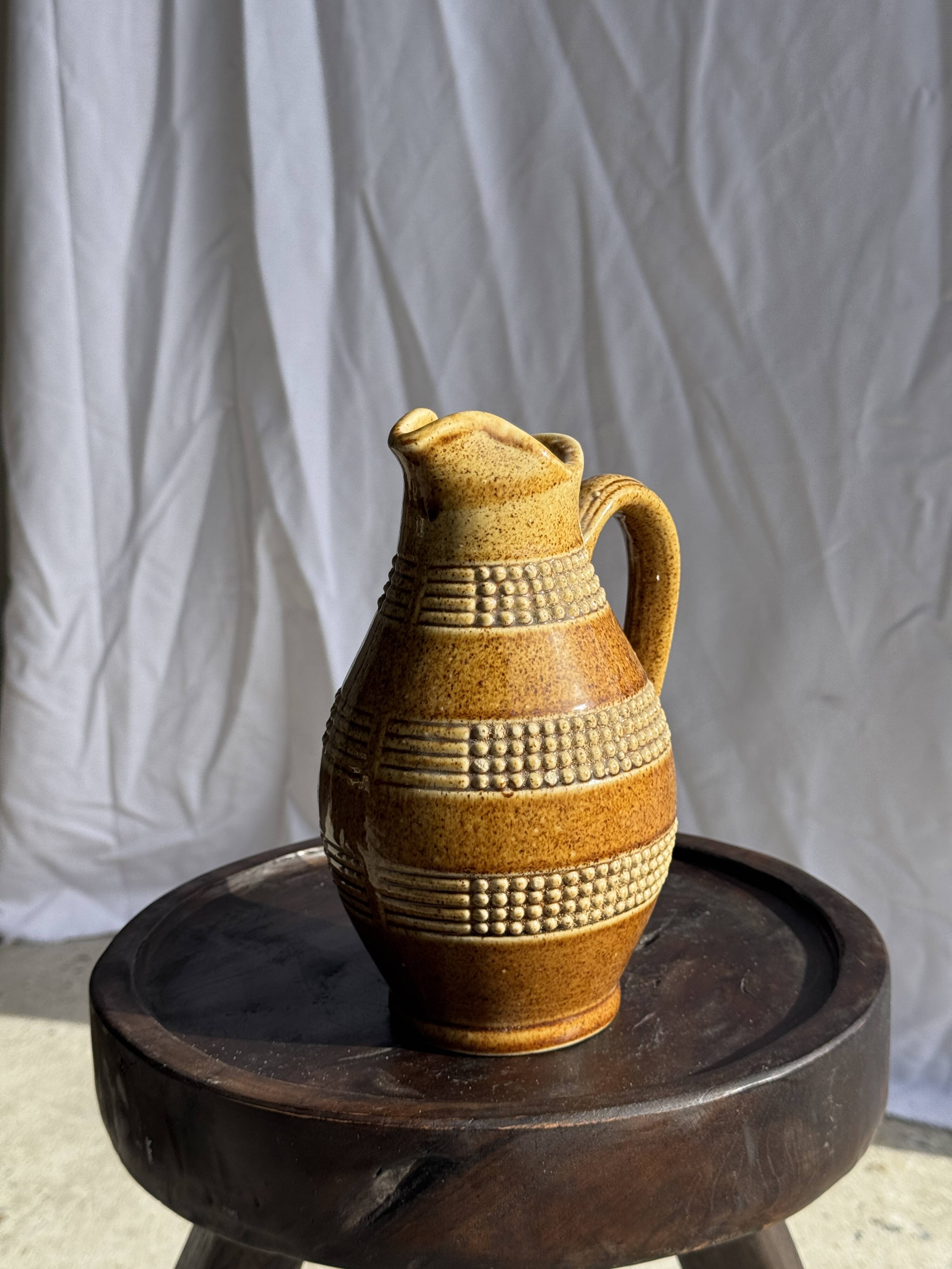 Vintage yellow stoneware carafe with beaded friezes Made in France H22