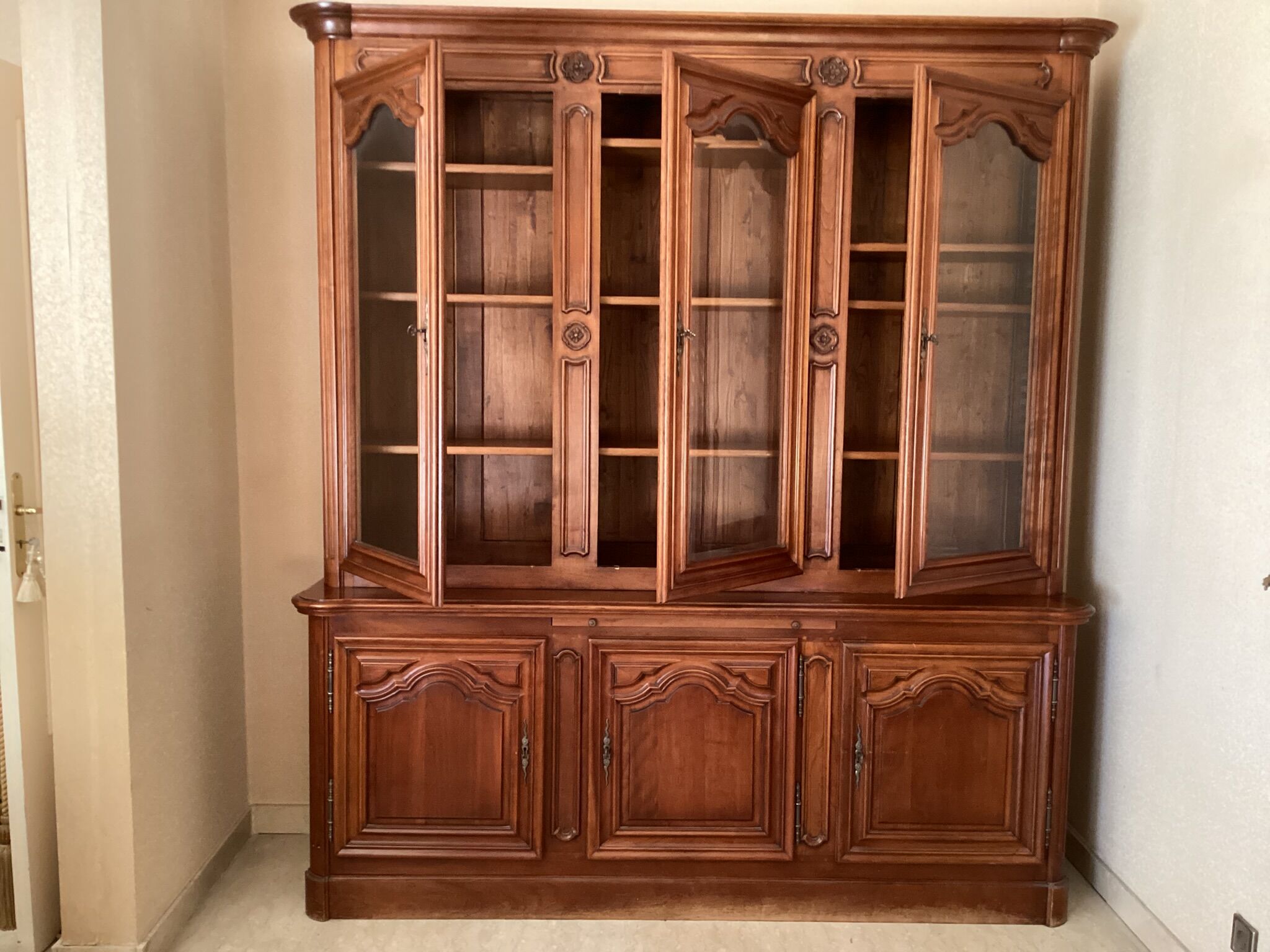 Cherry bookcase stamped Louis Tricoire