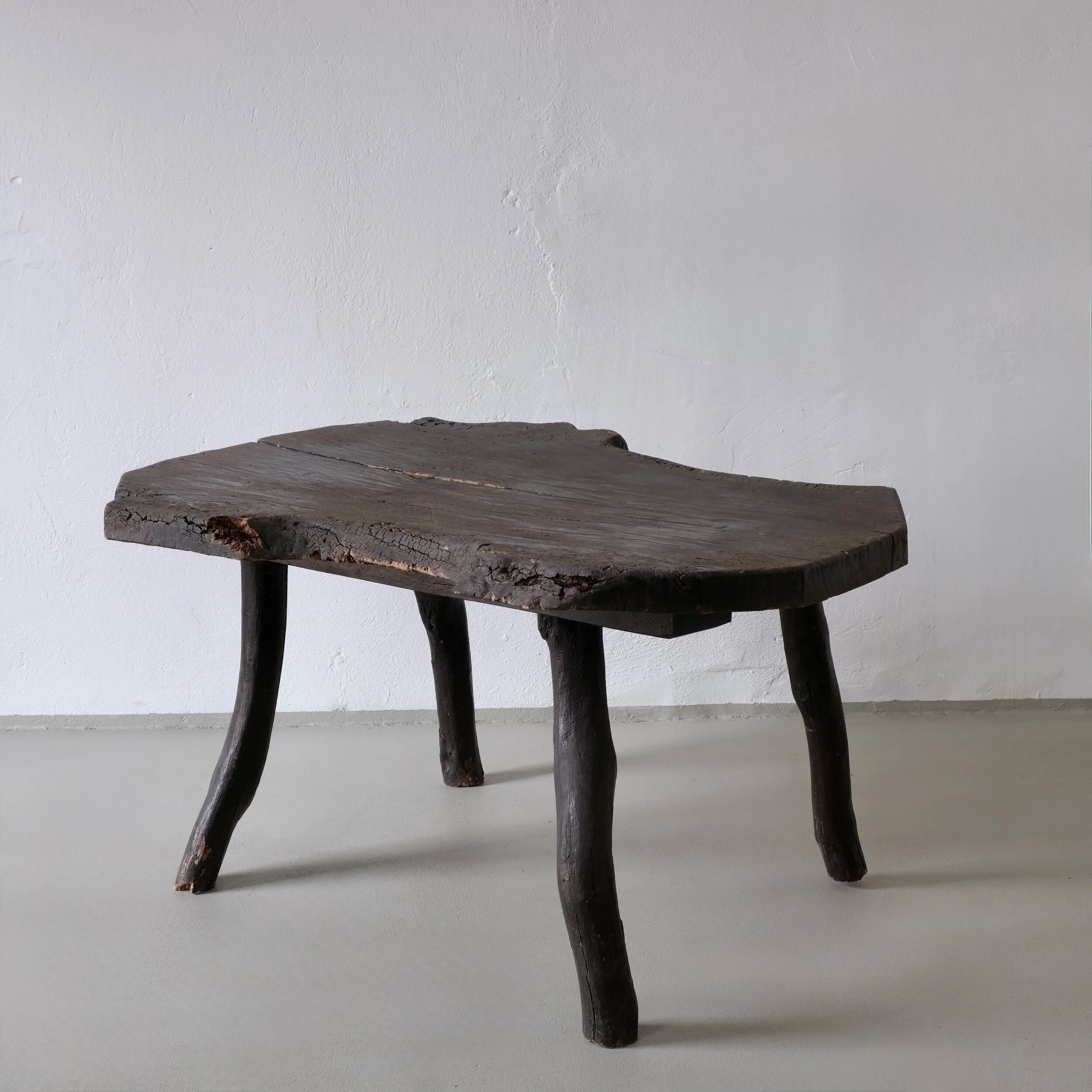 Wabi-sabi rustic dark wood side table | Belgium | Vintage