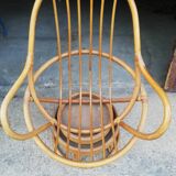 Fauteuil pivotant vintage en rotin