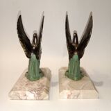 Art Deco bookends with metal swans, double patina and marble base.