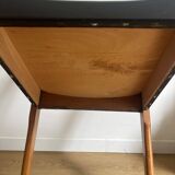 Vintage chair in wood and black leatherette