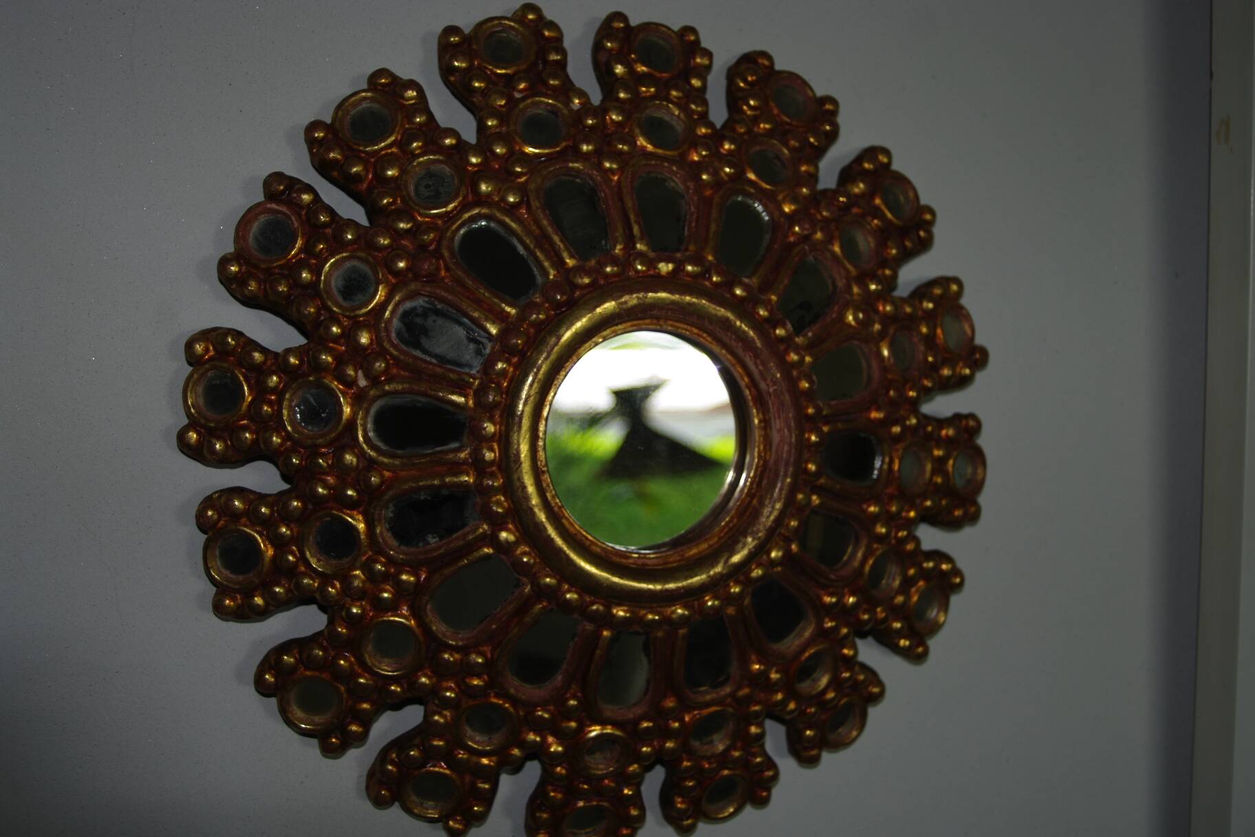 Vintage multi-faceted witch mirror in golden wood 1960 rare