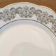 8 white and gold porcelain dessert plates