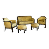 A set of two armchairs, a sofa and two poufs in lacquered wood with gilded chinoiserie decoration.