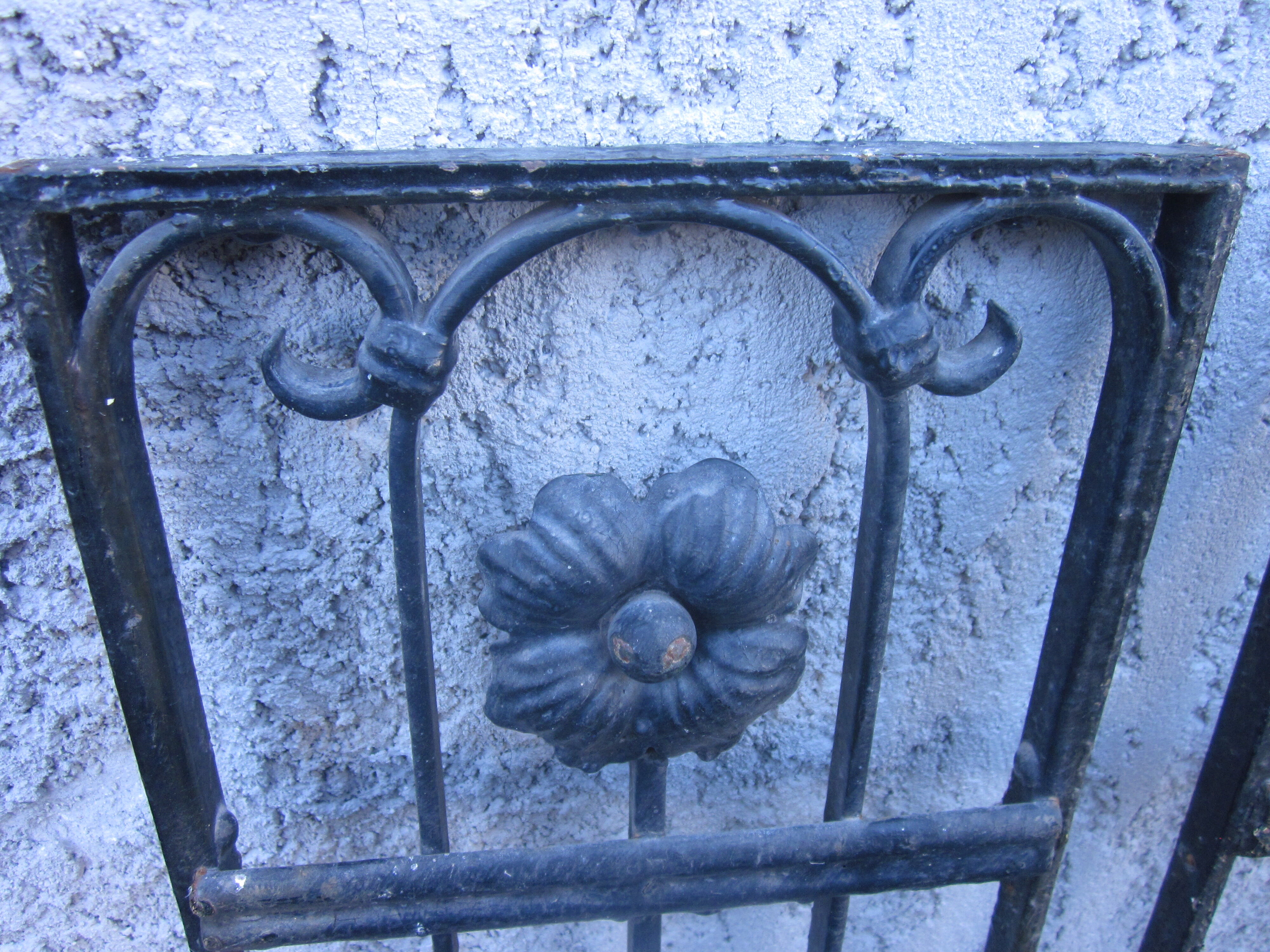 Pair of old wrought iron grid