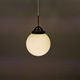 Small Art Deco hanging lamp in cream coloured glass and bakelite top.