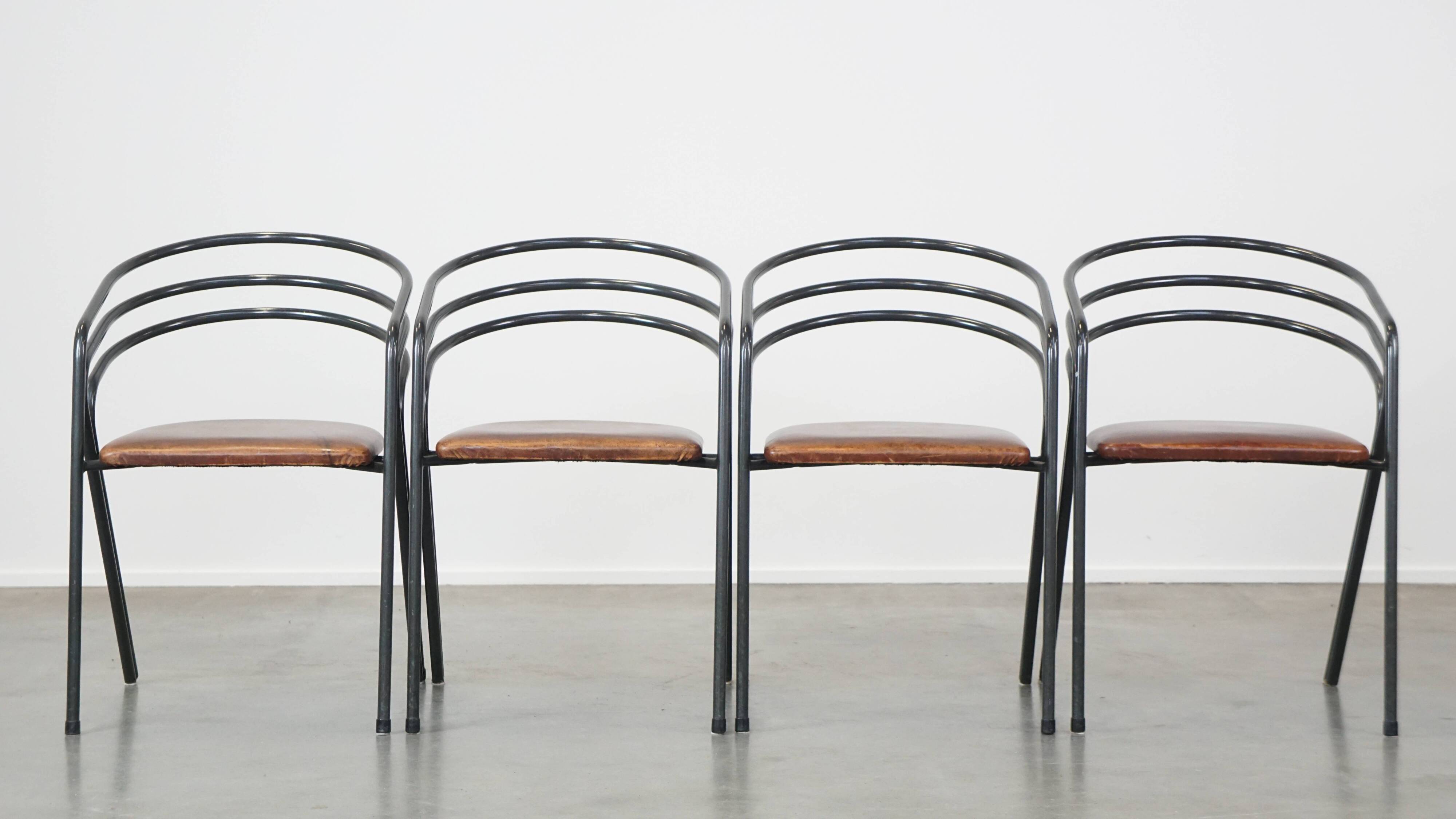 Set of 4 1970s design dining chairs with leather seats and metal frame