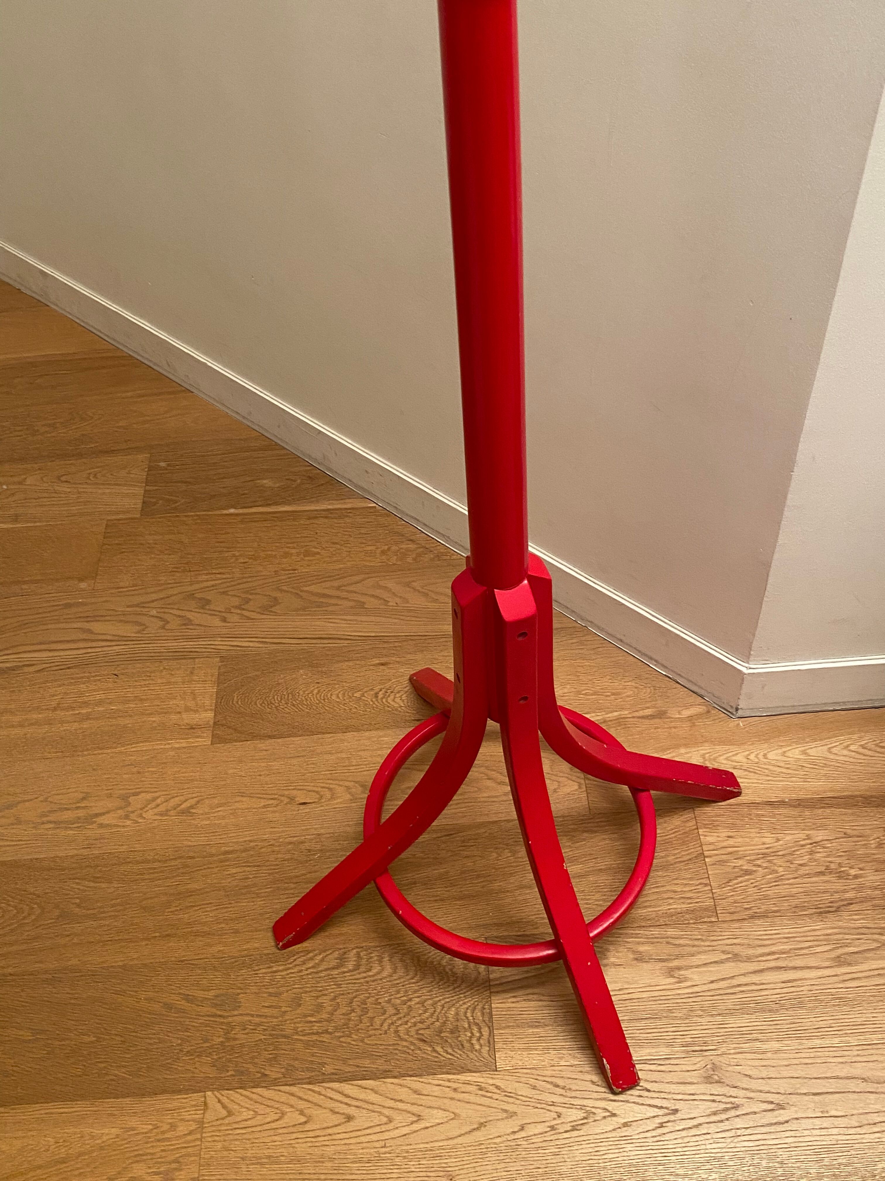 Red Baumann parrot coat rack