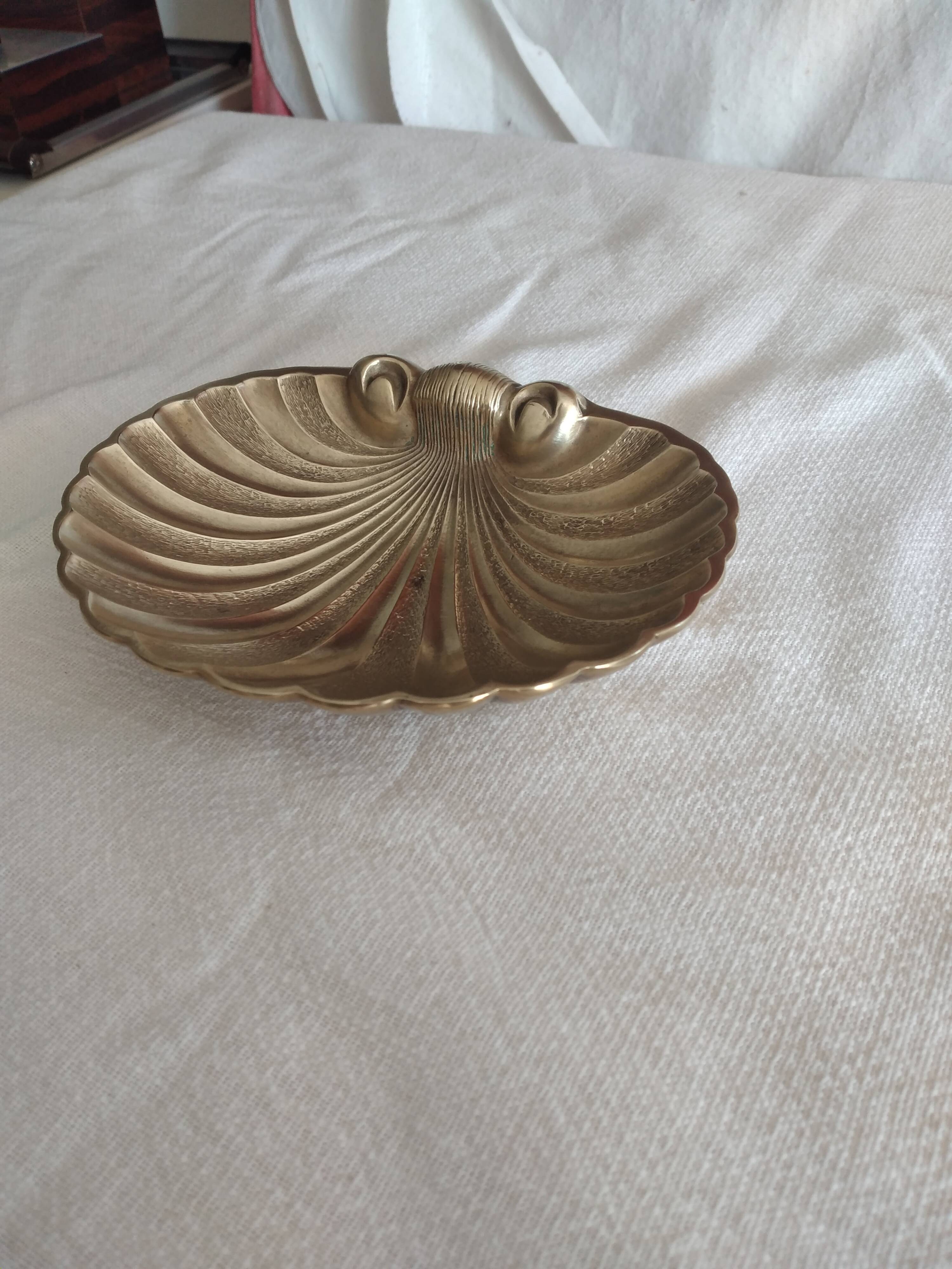 Bronze shell ashtray or pocket emptier