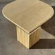 Large designer coffee table in travertine, eye shape, Roche Bobois edition from the 80s